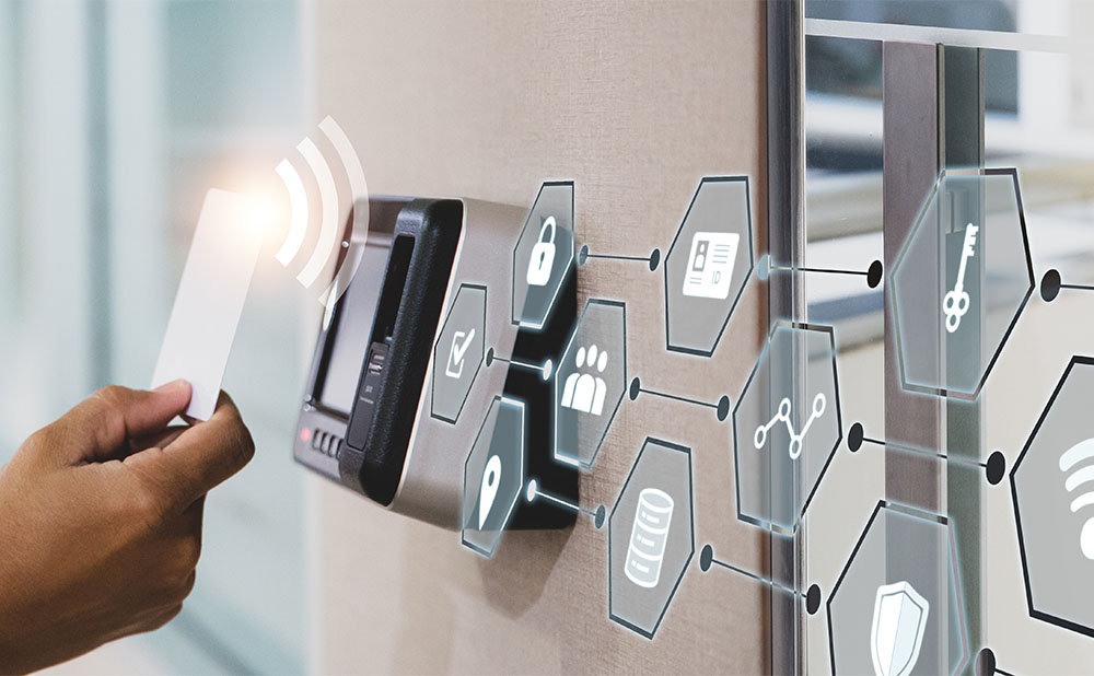 man holding card up to card reader